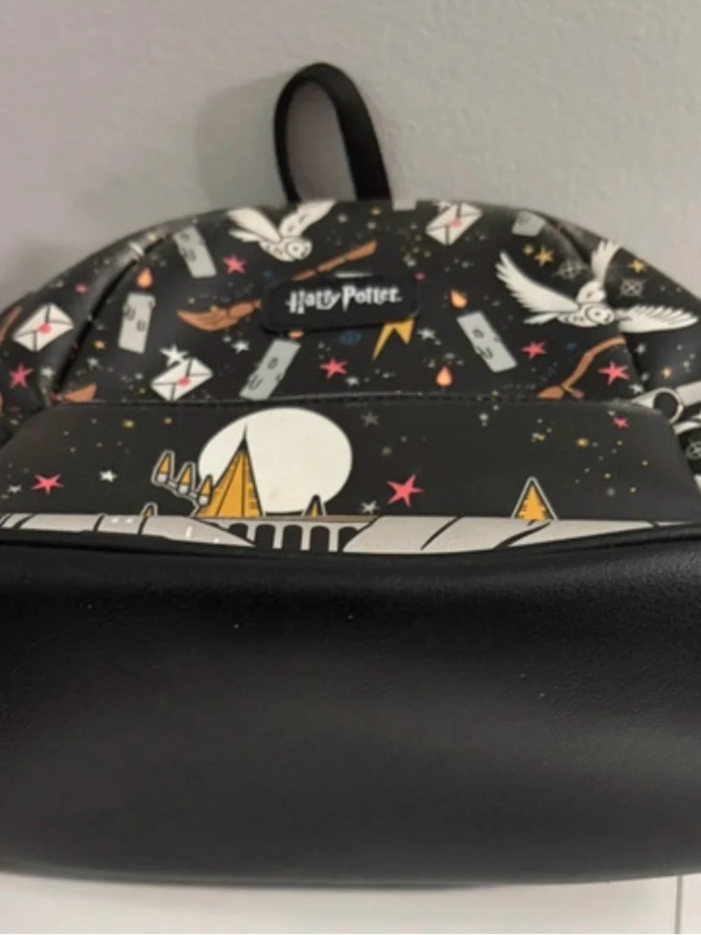 Warner Bros. Harry Potter Black Mini Backpack with Gold & White Accents